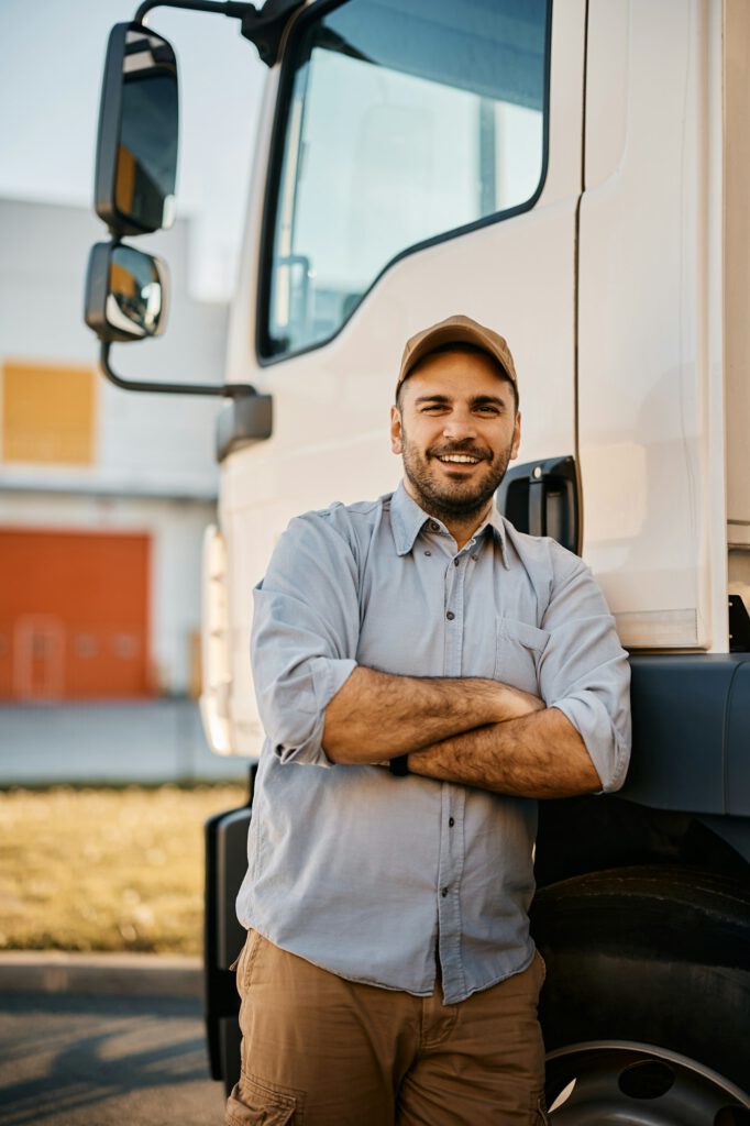 Portrait of confident truck driver looking at camera.